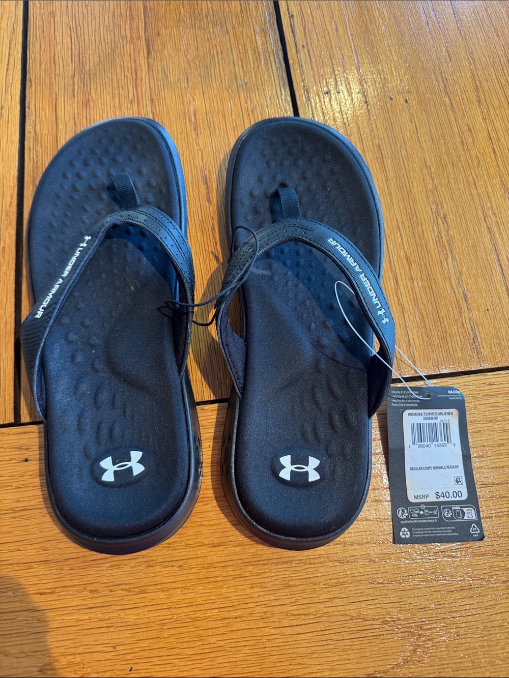 Under Armour ladies Black Flip-Flop Sandals with White Logo